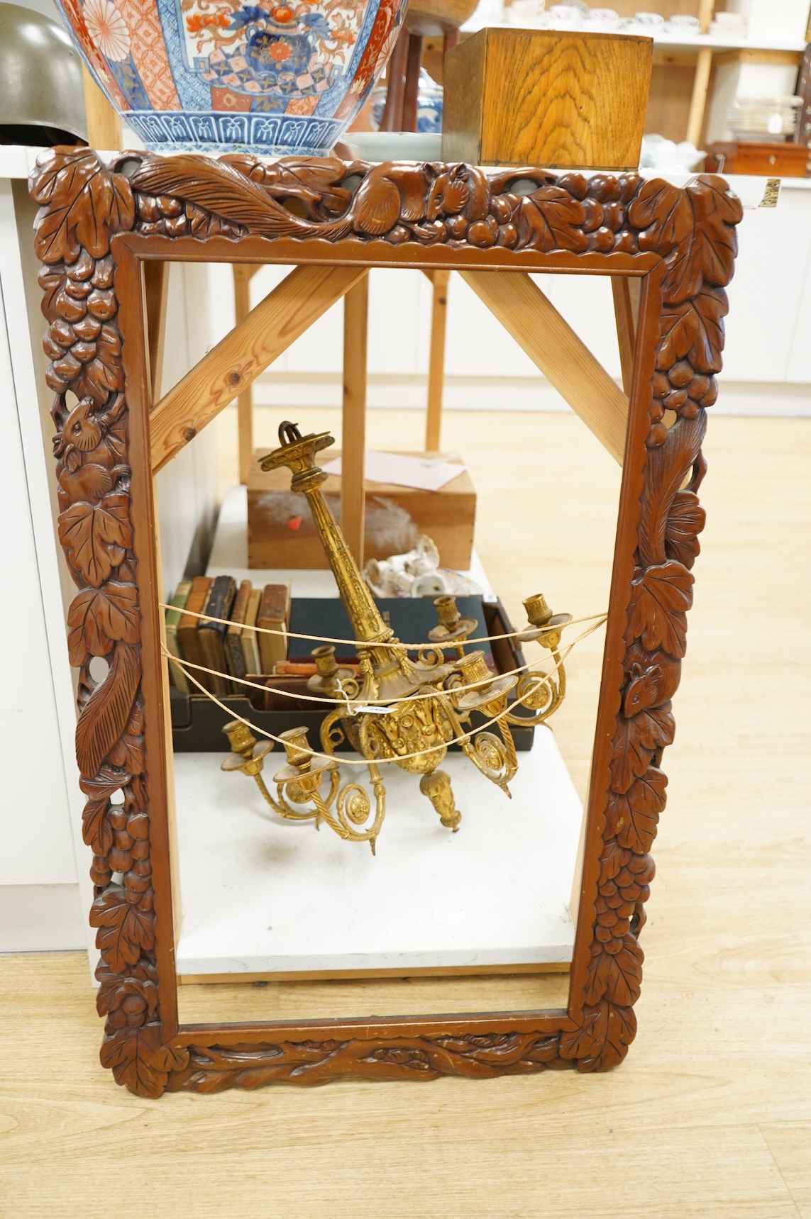 Two picture frames to include a carved wood example, aperture size 74 x 41cm
